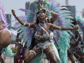 The Toronto Caribbean Carnival heats ups the streets of Toronto on Saturday, Aug. 3, 2019. (Stan Behal/Toronto Sun/Postmedia Network)