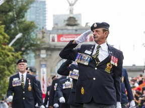 Canadian Armed Forces veteran Garry Pond marches in the 98th Warriors' Day Parade at the CNE on Saturday August 17, 2019.