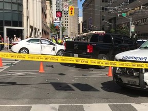 The scene of a collision at Bay and College Sts. in Toronto on Aug. 22, 2019. (Traffic Services/Twitter)