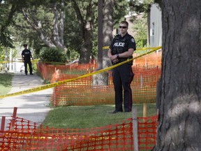 Toronto Police investigate the city's 37th murder of the year after one man was killed and another wounded in a shooting on Wakunda Pl. on Friday, Aug. 9, 2019. (Stan Behal/Toronto Sun/Postmedia Network)