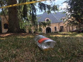 A discarded liquor bottle outside 37 The Bridle Path in Nork York, the site of an early-morning shooting on Sunday, Aug. 4 2019.