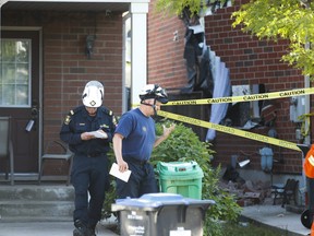 Investigators at the scene of a home explosion in north Brampton on Tuesday, August 13, 2019. Jack Boland/Toronto Sun
