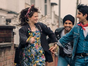 Nell Williams, left, Aaron Phagura, centre, and Viveik Kalra in "Blinded by the Light." (Warner Bros. Pictures)