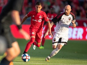 The Ottawa Fury's Jérémy Gagnon-Laparé closes in on Toronto FC's Erickson Gallardo during the second leg of their Canadian Championship semifinal in Toronto. Paul Giamou/Toronto FC