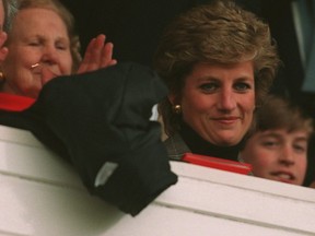 Princess Diana applauds from the box during the Five Nation International between Wales and Ireland at Cardiff Arms Park, March 18, 1995. (Clive Mason/ALLSPORT)