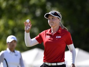 Brooke Henderson reacts after completing the final round of the CP Womens Open golf tournament  at Magna Golf Club.