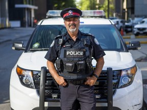 Retiring Toronto Police Sgt. Mark Hayward outside 52 Division in downtown Toronto, Ont. on Wednesday, Aug. 21, 2019. (Ernest Doroszuk/Toronto Sun/Postmedia)