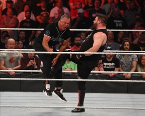 Kevin Owens delivers a low blow to Shane McMahon during their match at SummerSlam on Sunday, Aug. 11, 2019, at Scotiabank Arena in Toronto. Owens won the matchup.(Photo by Joseph Hrycych/For SLAM! Wrestling)