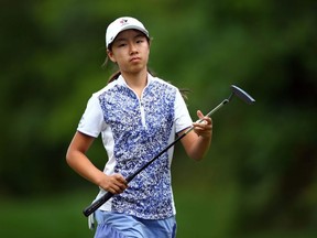 Michelle Liu, of Vancouver, reacts after sinking her putt on the 16th green during the first round of the CP Women's Open at Magna Golf Club in Aurora, Ont., on Thursday, Aug. 22, 2019.