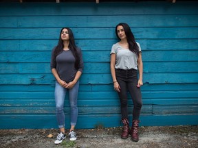 Detective Anisha Parhar, left, and Sgt. Sandy Avelar, who run a program on their own time to try and keep girls out of gangs, pose for a photograph in Vancouver, on Wednesday July 3, 2019.