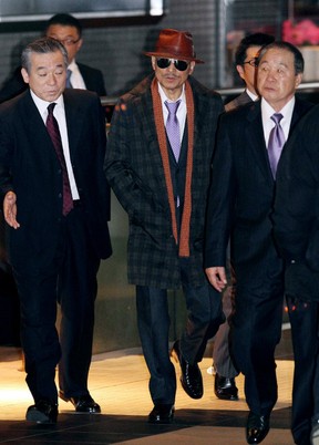 Kenichi Shinoda, the boss of Japan’s largest Yakuza gang, the Yamaguchi-gumi, at Tokyo’s Shinagawa station. GETTY IMAGES