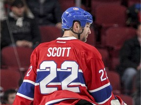 Montreal Canadiens' John Scott takes part in the warm-up prior to National Hockey League game against the Florida Panthers in Montreal Tuesday April 5, 2016.