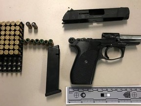 Police executed a search warrant and seized this pistol and ammunition.
(Toronto Police handout)