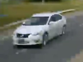 An image released by Toronto Police of a white sedan believed to have been involved in a fatal hit-and-run at Sheppard and Midland Aves. on Wednesday, Aug. 21, 2019.