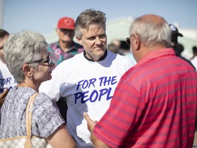 Ontario's new Finance Minister Rod Phillips speaks to supporters during Ford Fest in Markham, Ont., on Saturday June 22, 2019.  THE CANADIAN PRESS/Chris Young