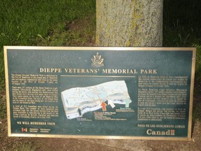 The Dieppe Veterans' Memorial Park sign stolen in Hamilton is seen after its recovery.