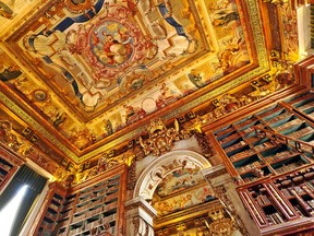 King Joao's Library, in Coimbra, Portugal, has a spectacular Baroque ceiling. (Dominic Arizona Bonuccelli)