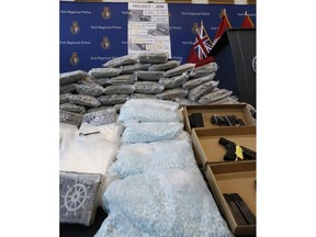 York Regional Police unveiled drugs (meth, cocaine, fentanyl, cannabis bound for U.S.), weapons and proceeds of crime during two unrelated Projects called Zen and Moon targeting organized crime arresting 49 people on Thursday August 8, 2019. Jack Boland/Toronto Sun/Postmedia Network