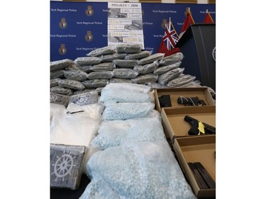 York Regional Police unveiled drugs (meth, cocaine, fentanyl, cannabis bound for U.S.), weapons and proceeds of crime during two unrelated Projects called Zen and Moon targeting organized crime arresting 49 people on Thursday August 8, 2019. Jack Boland/Toronto Sun/Postmedia Network