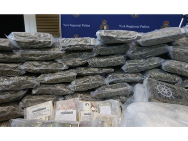 York Regional Police unveiled drugs (meth, cocaine, fentanyl, cannabis bound for U.S.), weapons and proceeds of crime during two unrelated Projects called Zen and Moon targeting organized crime arresting 49 people on Thursday August 8, 2019. Jack Boland/Toronto Sun/Postmedia Network