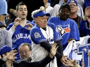 A foul ball goes into the stands between the Toronto Blue Jays and the Kansas City Royals during Game 5 of the American League Championship Series at the Rogers Centre in Toronto on October 21, 2015. Craig Robertson/Toronto Sun