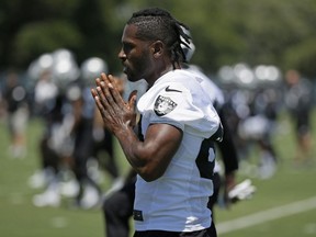 In this June 11, 2019, file photo, Oakland Raiders wide receiver Antonio Brown is shown during an NFL football minicamp in Alameda, Calif.