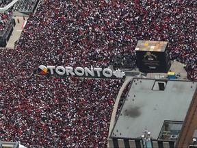 Fans gather at Nathan Phillips Square as they turn out for the Toronto Raptors NBA Championship Victory Parade after defeating the Golden State Warriors in the Finals on June 17, 2019 in Toronto. (Tom Szczerbowski/Getty Images)