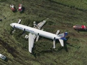 A still image, taken from a drone video footage, shows the Ural Airlines Airbus 321 passenger plane following an emergency landing in a field near Zhukovsky International Airport in Moscow Region, Russia, on Thursday, Aug. 15, 2019.