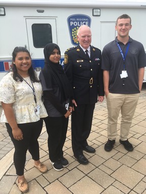 Peel Regional Police interim Chief chris McCord with members of the Youth in Policing initiative, (L to R) Zuriel Lagunes, 20, Nimra Tul Noor, 17 and Joshua Bernard, 17. (Joe Warmington/Toronto Sun/Postmedia Network)