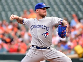 Blue Jays pitcher Sean Reid-Foley throws a pitch during first inning MLB action against the Orioles at Oriole Park at Camden Yards in Baltimore, on Sunday, Aug. 4, 2019.