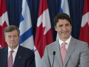 Toronto Mayor John Tory, left, and Prime Minister Justin Trudeau at Toronto City Hall on Tuesday, August 13, 2019. Stan Behal/Toronto Sun