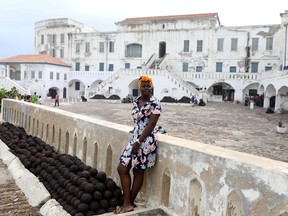 Charity Butler Agyemang, a Ghananian tour guide looks on at the Cape Coast Slave Castle in Ghana.  REUTERS/Siphiwe Sibeko