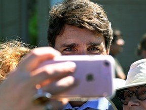 Canada's Prime Minister Justin Trudeau poses for a photo with supporters at the Niagara-on-the Lake Community Centre in Niagara-on-the-Lake, Ontario, Canada, August 14, 2019.