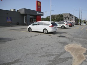 Police investigate after a shooting outside of the McDonald's at the 401 and Weston Rd on Tuesday, August 20, 2019. (Veronica Henri/Toronto Sun)