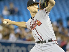 Braves starting pitcher Mike Soroka delivers a pitch to the plate at the Rogers Centre last night. Veronica Henri/Toronto Sun