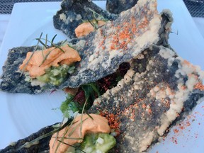 Creatively indulgent uni tacos at The Victor inside Parq resort in Vancouver. (Kevin Hann)