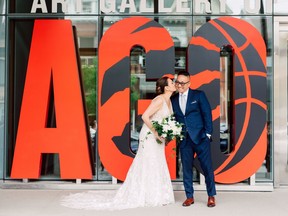 Sarah Gosevitz and Boris Pan on their wedding day outside the Art Gallery of Ontario in Toronto. (Photo courtesy  Purple Tree Photography)