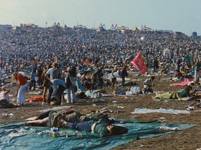 Attendees at the Woodstock Music Festival in August 1969, Bethel, New York, U.S. in this handout image. (John "Jack" NIflot (Gift of Duke Devlin)/The Museum at Bethel Woods/Via REUTERS)