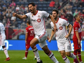 Toronto FC defender Omar Gonzalez celebrates after scoring against Chicago on Sunday. (USA TODAY SPORT)