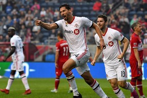 Toronto FC defender Omar Gonzalez celebrates after scoring against Chicago on Sunday. (USA TODAY SPORT)