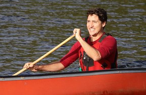 Federal Liberal leader Justin Trudeau canoes around Lake Laurentian during a campaign stop at the Lake Laurentian Conservation Area in Sudbury, Ont. on Thursday, Sept. 26, 2019. (John Lappa/Postmedia Network)