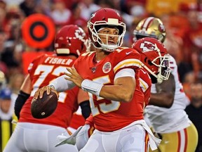 Quarterback Patrick Mahomes of the Kansas City Chiefs drops back to pass during the first half of a preseason game against the San Francisco 49ers at Arrowhead Stadium on August 24, 2019 in Kansas City, Missouri.