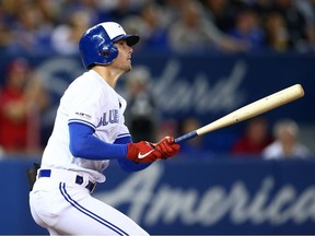 Cavan Biggio #8 of the Toronto Blue Jays hits a home run in the third inning during a MLB game against the Boston Red Sox at Rogers Centre on September 10, 2019 in Toronto, Canada.