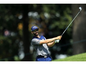 Adam Hadwin of Canada plays a shot on the 14th hole during the second round of the BMW Championship at Medinah Country Club No. 3 on August 16, 2019 in Medinah, Illinois.