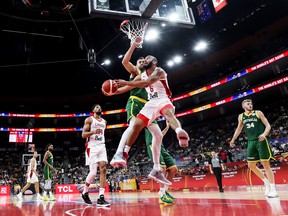 Cory Joseph of Canada drives to the Australian net during their 2019 FIBA World Cup, first-round match between Canada and Australia at the Dongguan Basketball Center on September 01, 2019 in Dongguan, China. (Photo by Zhizhao Wu/Getty Images)