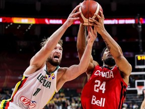 Khem Birch of Canada competes for the ball with Domantas Sabonis of Lithuania during the 2019 FIBA World Cup, first round match between Lithuania and Canada at Dongguan Basketball Center on September 03, 2019 in Dongguan, China.