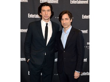Adam Driver (L) and Noah Baumbach attend Entertainment Weekly's Must List Party at the Toronto International Film Festival 2019 at the Thompson Hotel 
on Sept. 7, 2019 in Toronto.