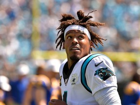 Cam Newton of the Carolina Panthers looks to the scoreboard as he leaves the field for halftime during their game against the Los Angeles Rams at Bank of America Stadium on September 8, 2019 in Charlotte, North Carolina. (Photo by Grant Halverson/Getty Images)