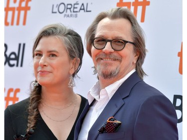 Gary Oldman and Gisele Schmidt attend "The Laundromat" premiere during the 2019 Toronto International Film Festival at Princess of Wales Theatre on September 09, 2019 in Toronto, Canada.