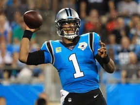 Quarterback Cam Newton of the Carolina Panthers looks to pass in the first quarter against the Tampa Bay Buccaneers game at Bank of America Stadium on September 12, 2019 in Charlotte, North Carolina.